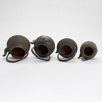 Four Japanese teapots.