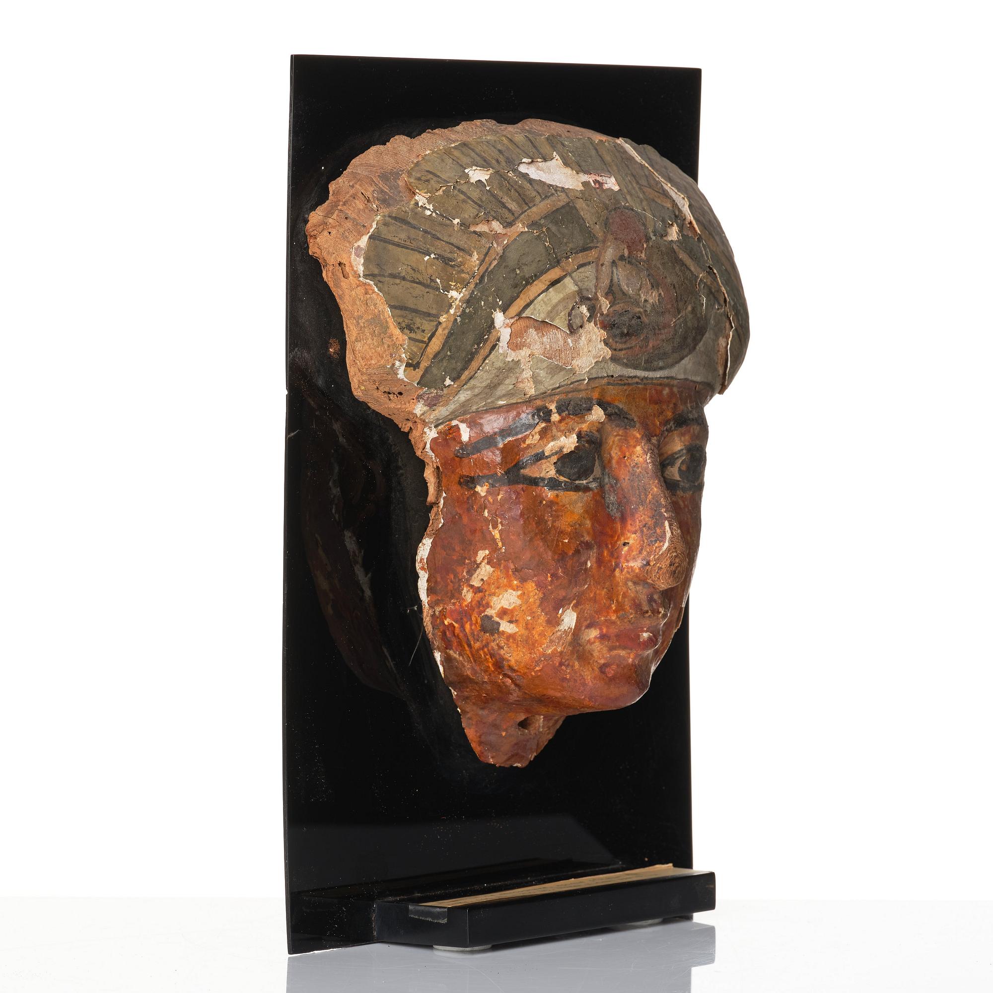 An Egyptian sarcophagus mask, ca 800-500 B.C.