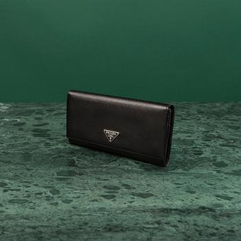 A wallet by Prada.