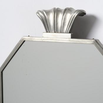 Firma Svenskt Tenn, a pewter wall mirror model "244", Stockholm, 1931.