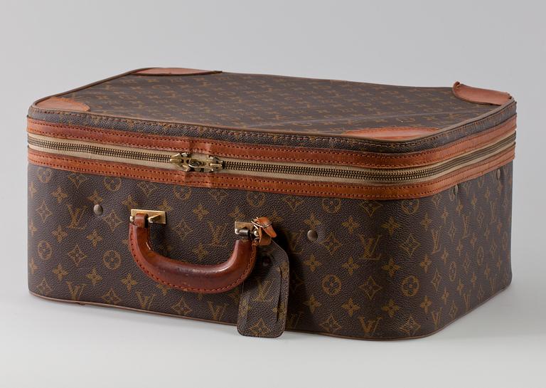 A Louis Vuitton weekend bag.