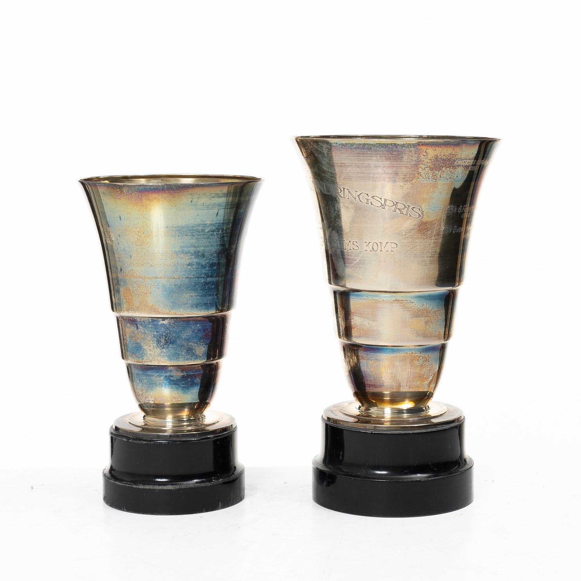Guldsmedsaktiebolaget (GAB), Two silver vases on wooden bases, Stockholm 1931-1933.