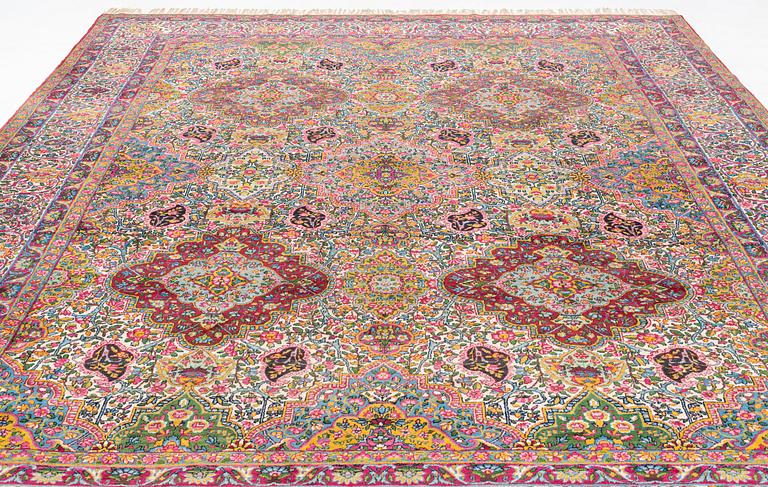 A semi-antique Kerman carpet, ca  402 x 291 cm.