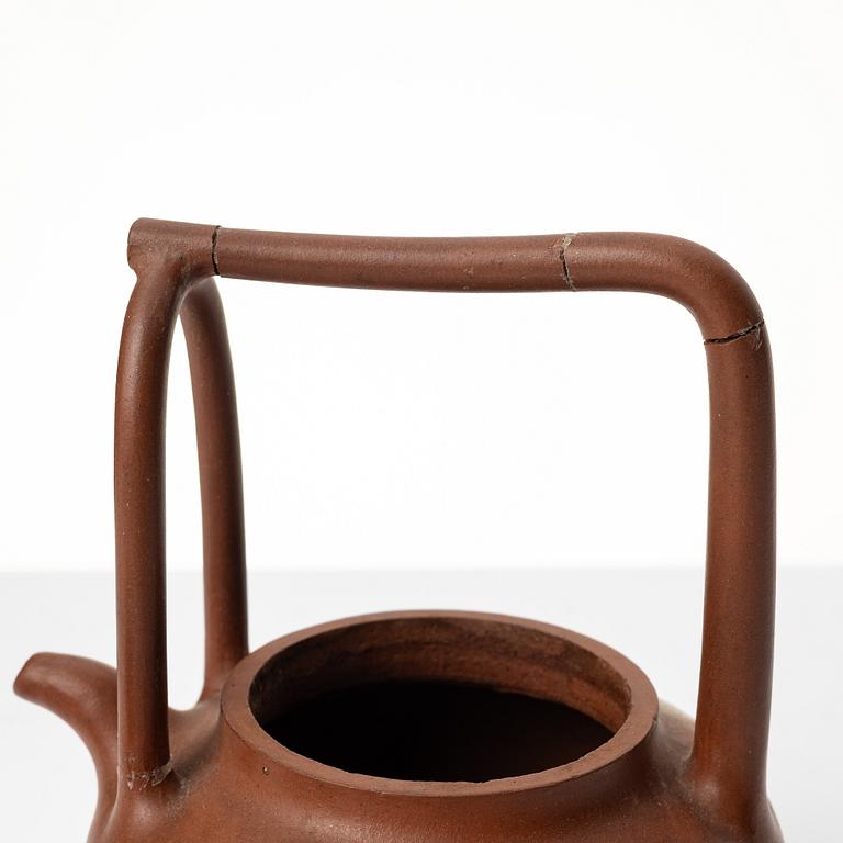 Two Chinese yixing teapots, early 1900s and 1980s.