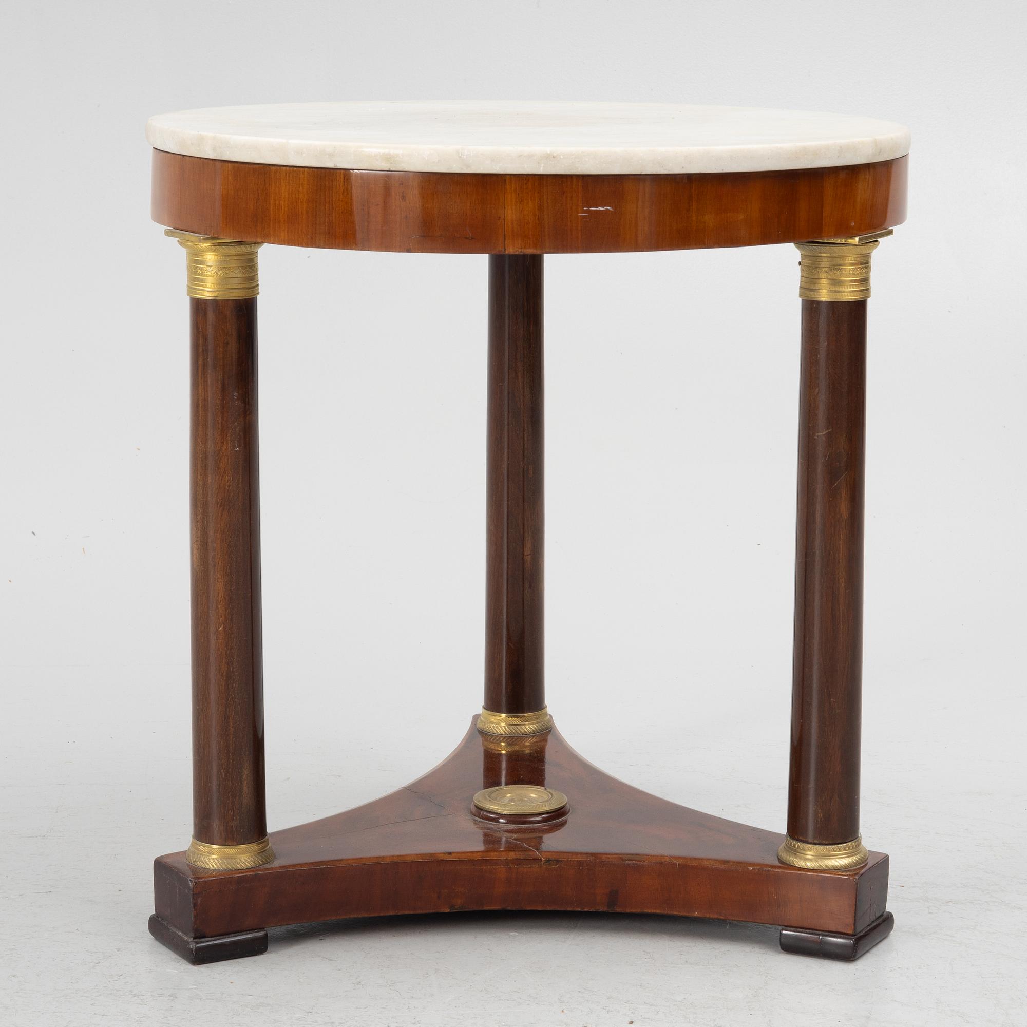 A Empire table, 19th Century.