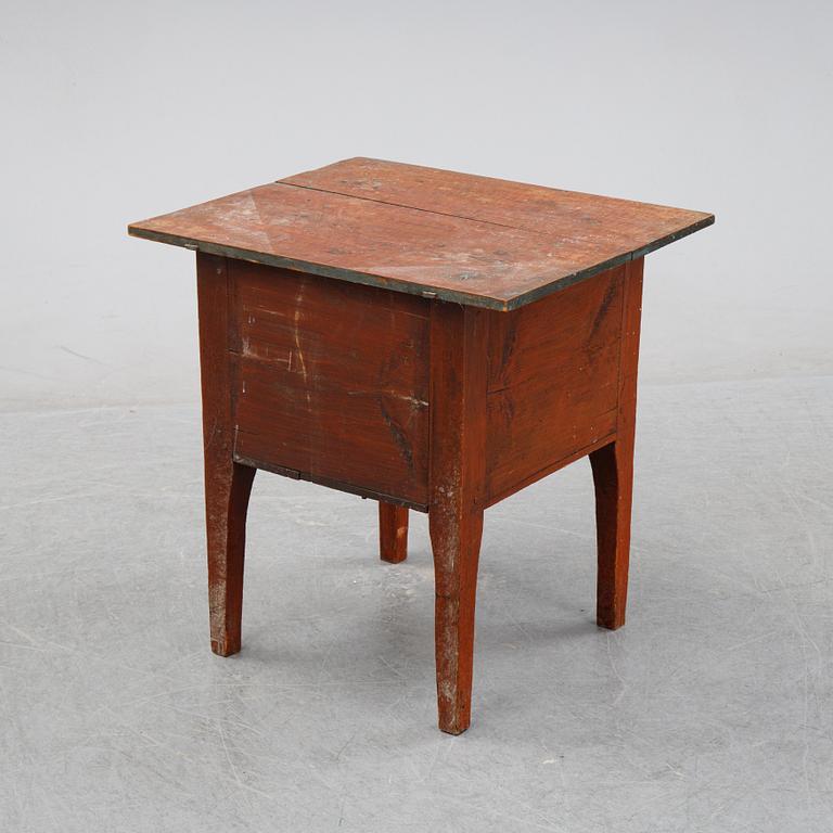 A swedish wooden table from Hälsingland, first half of the 19th century.