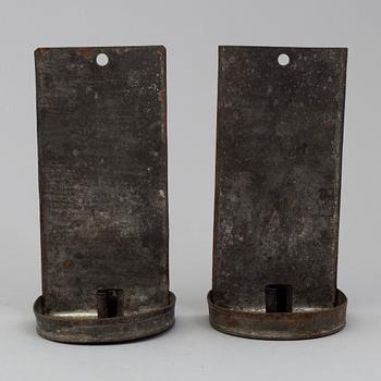 a pair of metal wall sconces, 19th century.