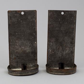 a pair of metal wall sconces, 19th century.