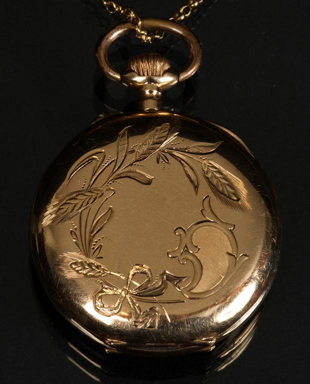 KLOCKA samt KLOCKKEDJA, guld, 14 k samt 18 k.