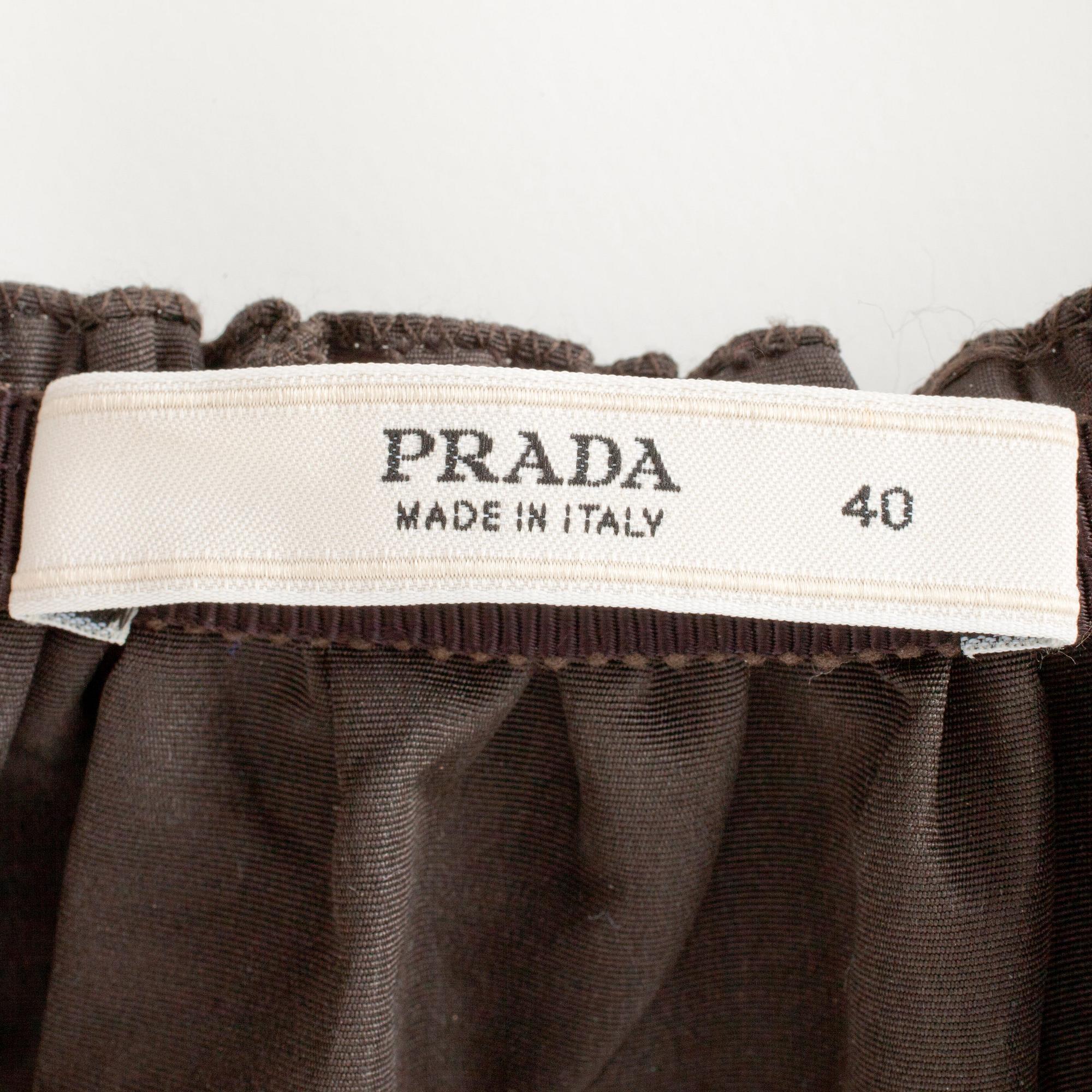 PRADA, a brown silk blend skirt.