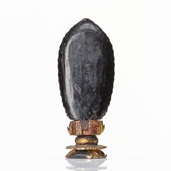 A miniature lacquer Buddha, Tibet/Nepal.