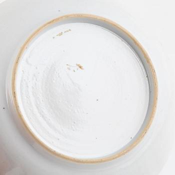 A small Chinese export tureen with cover, two cups, a saucer and a jug with cover, Qing dynasty, 18th century.