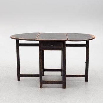 A Swedish wooden table, 19th century.