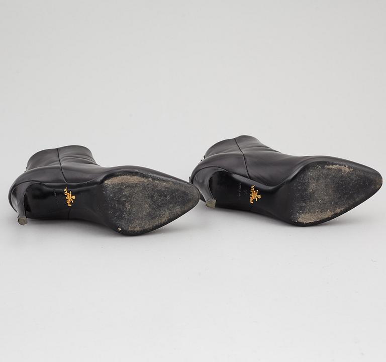 PRADA, a pair of black leather boots, size 35.