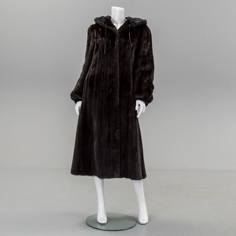 A mink coat by Saga Mink, in size 38/40.