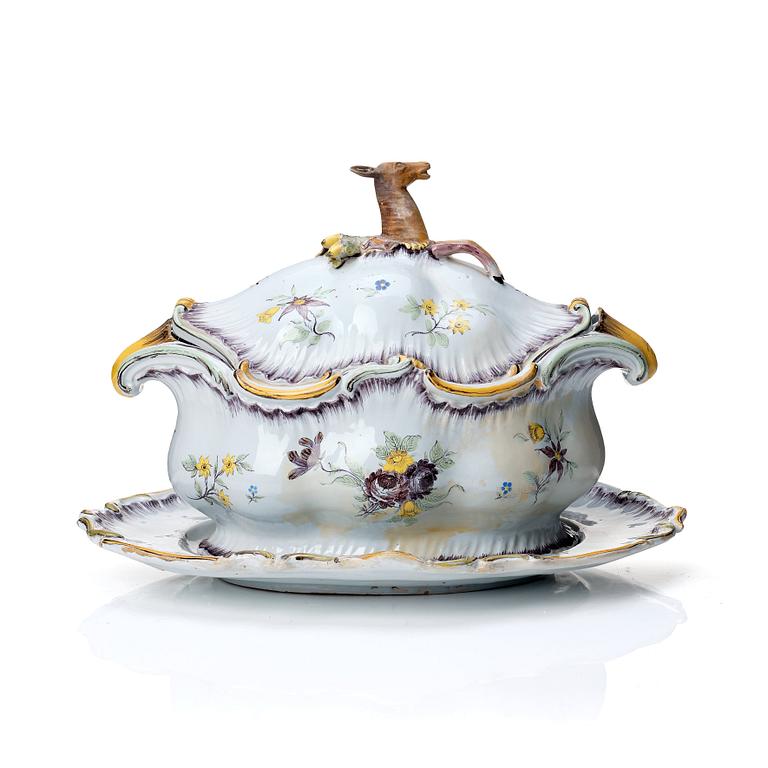A Swedish Rörstrand faience tureen with cover and stand, 18th Century.