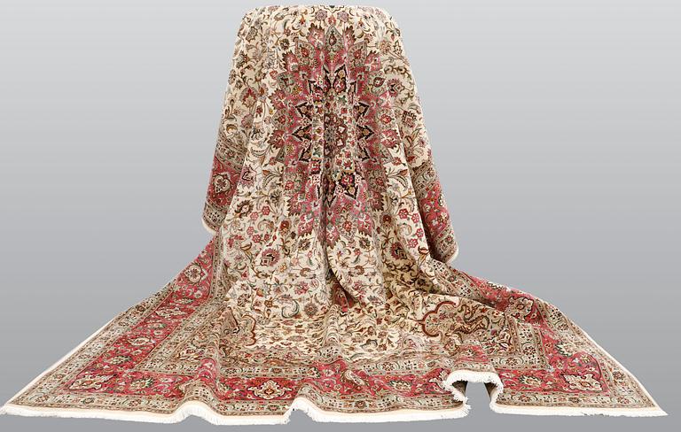 A carpet, Tabriz part silk, so called 50 Raj, cm 400 x 300 cm.