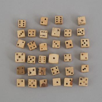 A COLLECTION OF 34 BONE MINIATURE DICE, 19th century.