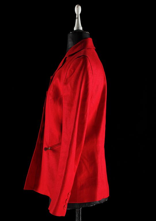 A red linen jacket by Hermès.