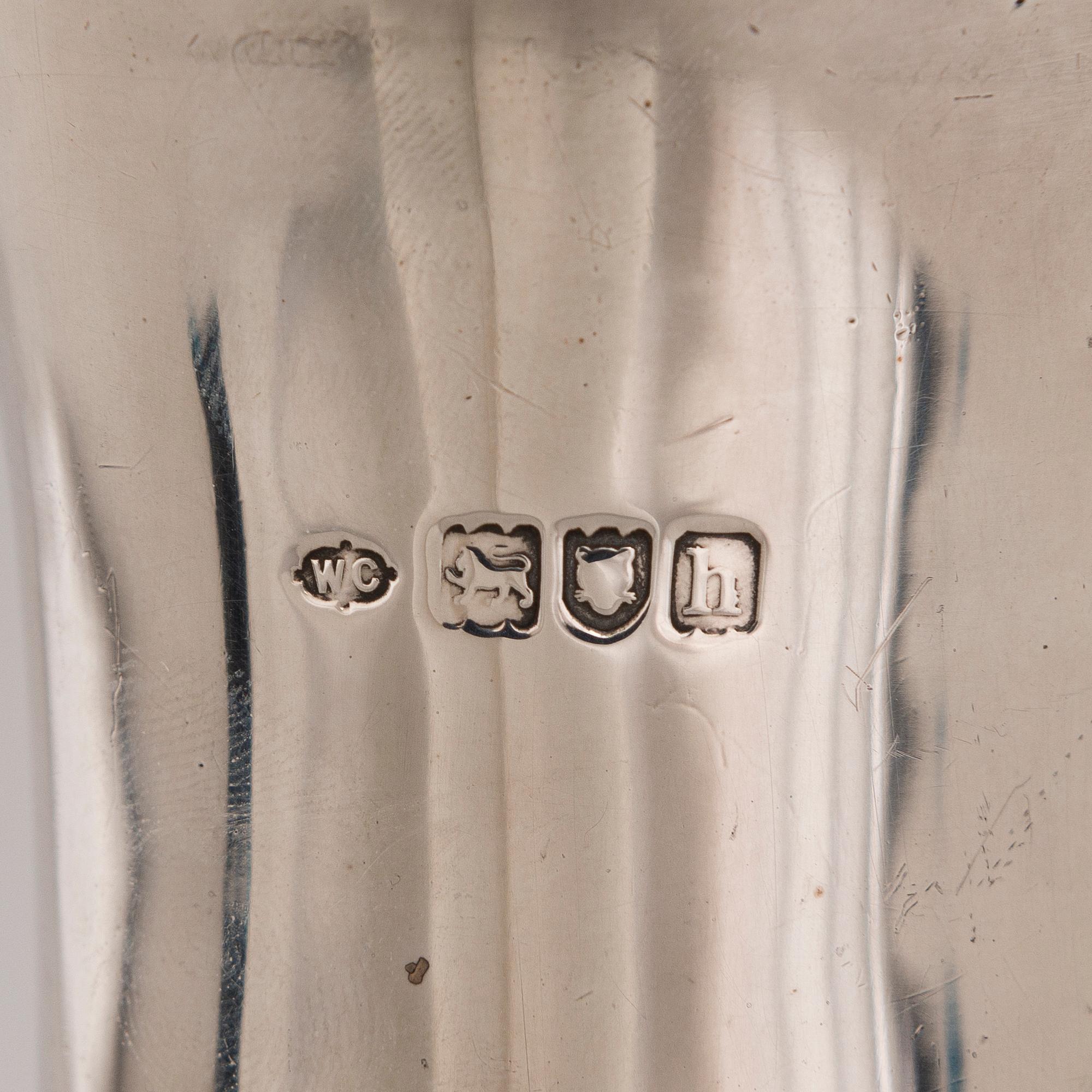 A sterling silver vase, mark of William Comyns & Sons, London 1903.
