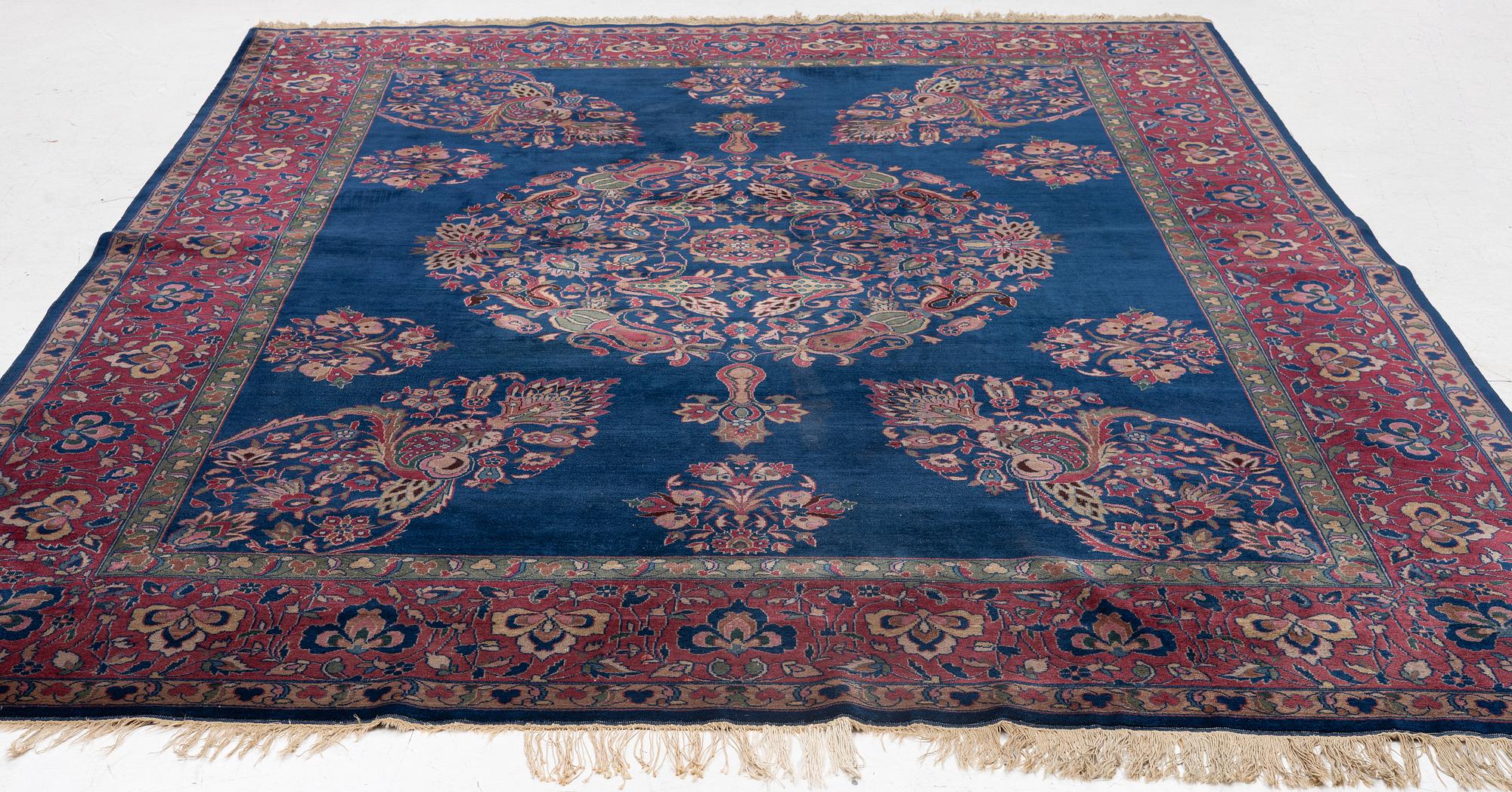 A semi-antique Amritsar carpet, north India c. 359 x 272 cm.