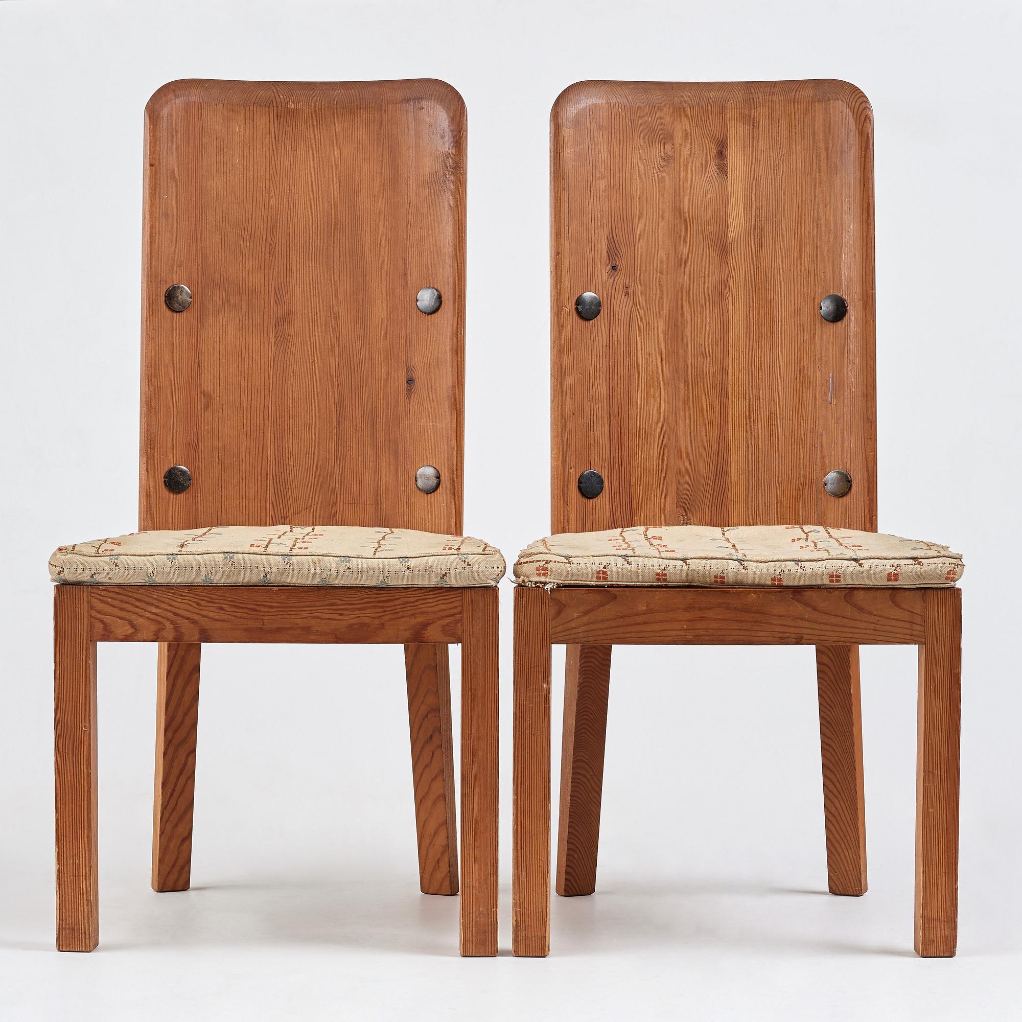 Axel Einar Hjorth, a pair of "Lovö" stained pine chairs, Nordiska Kompaniet, Sweden 1930's.