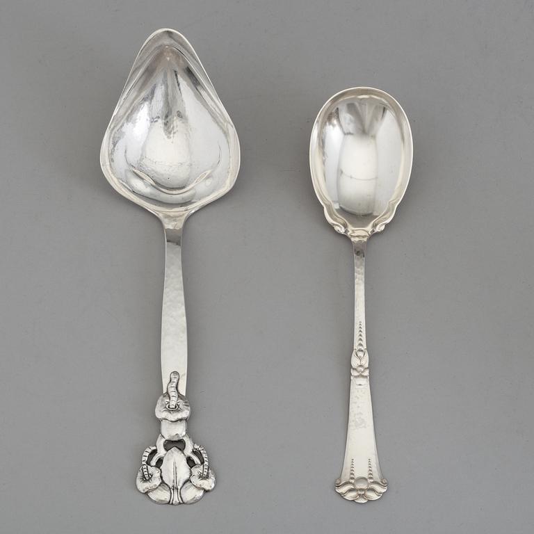 Two Art Nouveau silver serving spoons maker's marks Carl V Larsen, Copenhagen 1912 and Jonas Leo Nordin, Sollefteå 1924.