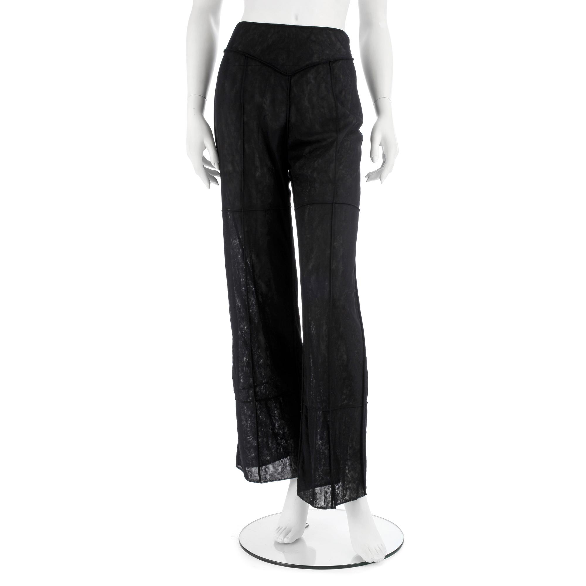 CHANEL, a black mesh evening pant.