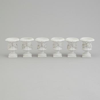 Six bisquit porcelain miniture vases, circa 1900, with Sevres like mark.