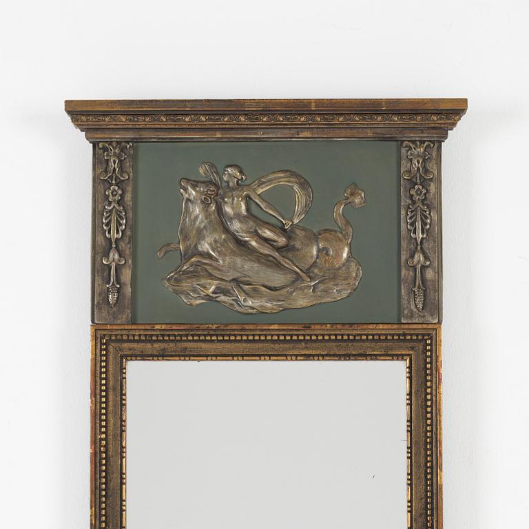 An Empire style mirror, first half of the 20th century.