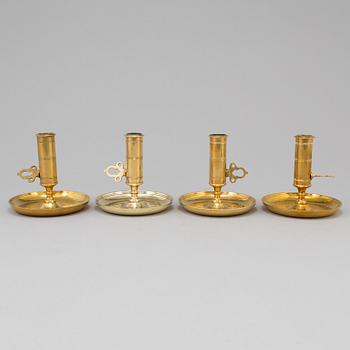 Four brass candlesticks from Skultuna and Svenska Metallverken, second half of the 20th Century.