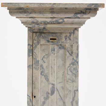 A Swedish column-shaped cabinet late 19 th century.