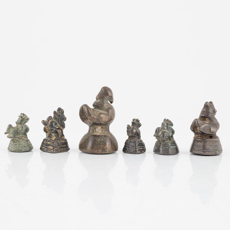 A group of six Burmese opium weights, 19th/20th Century.