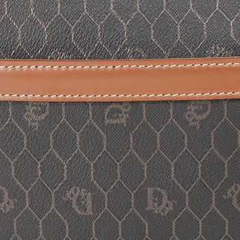 CHRISTIAN DIOR, a brown bag and briefcase.