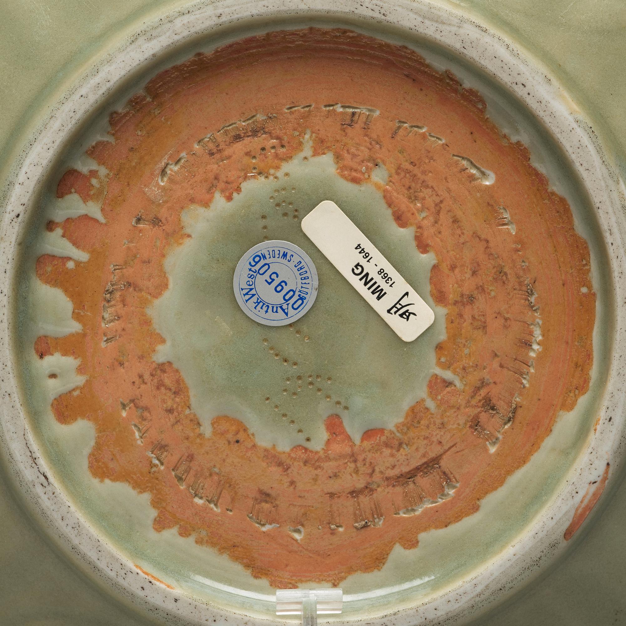 A celadon glazed dish, Ming dynasty (1368-1644).