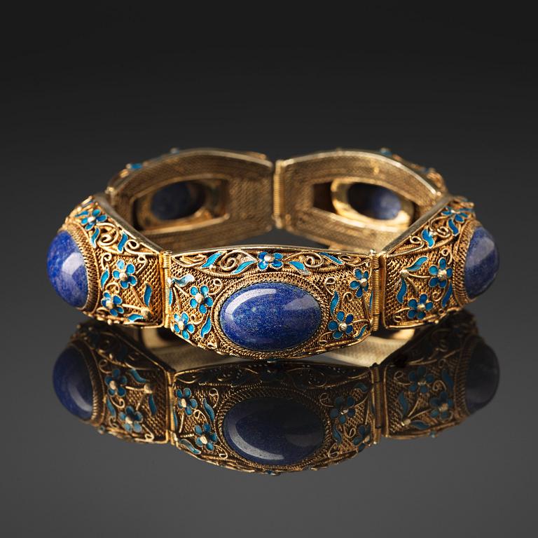 A gilt silver and enamelled Chinese bracelet, early 20th Century.