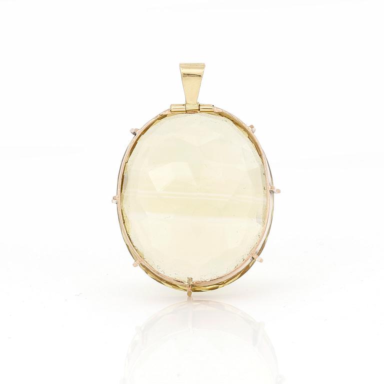 HÄNGE, 15K guld med oval facetterad citrin, ca 85,37 ct. Vikt ca 24,19 g.