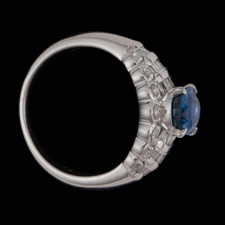 A untreated sapphire, 2.11 cts, and diamond, 0.75 cts in total, ring.