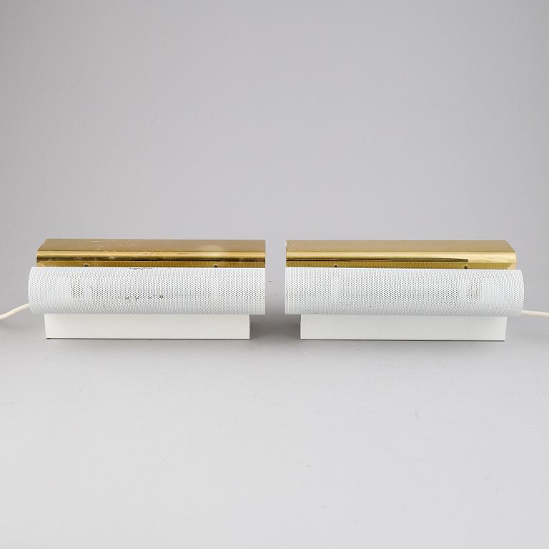 Hans-Agne Jakobsson, a pair of 'V-451/18L'/'Rasputin' brass wall lights from Markaryd.