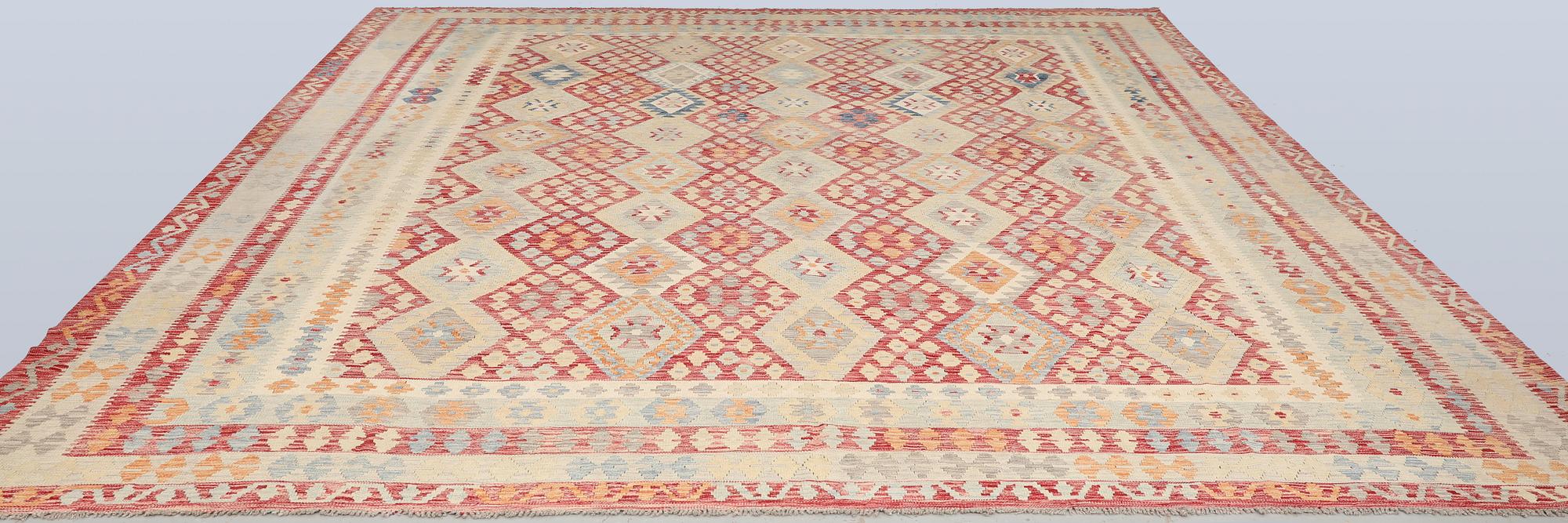 A Kilim carpet, approx. 433 x 369 cm.