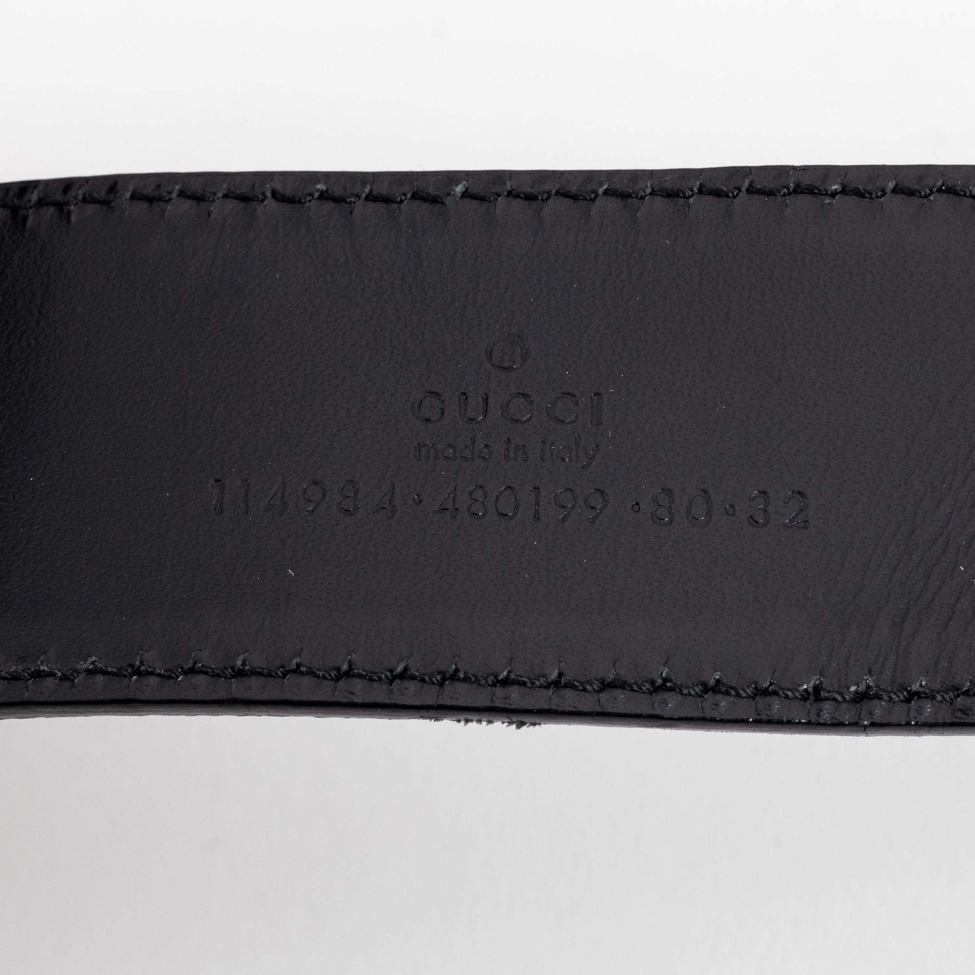 Gucci, a leather and textile belt, size 80.