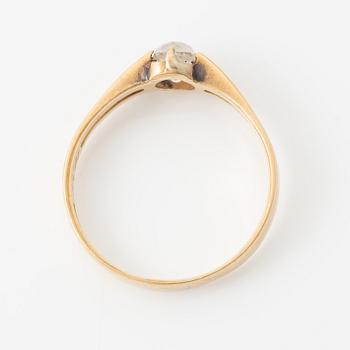 Ring 18K guld med en gammalslipad diamant.