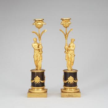 A pair of Louis XVI late 18th Century candlesticks.