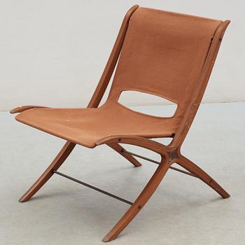 A Peter Hvidt & Orla Mølgaard Nielsen teak, beech and canvas 'X-Chair', Fritz Hansen, Denmark 1950's.