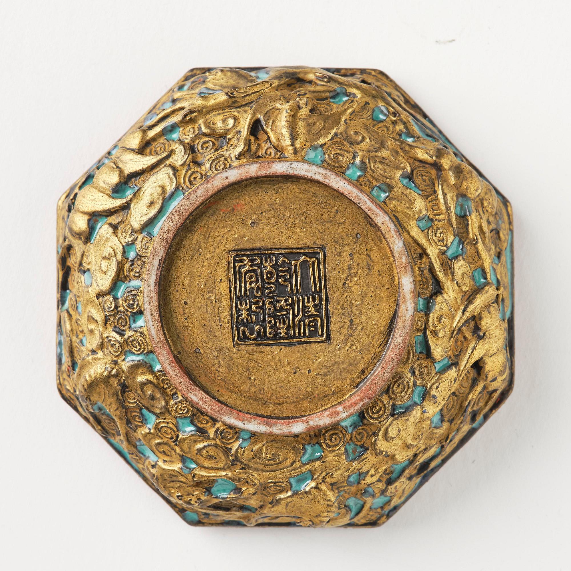 A bronze imitating seal paste box with cover, Qing dynasty, with Qianlong mark.