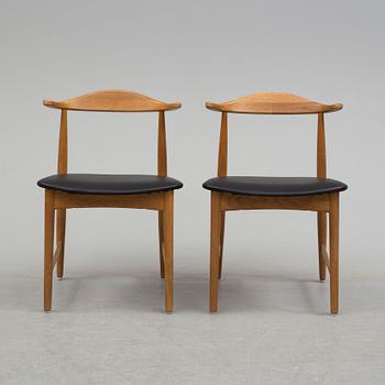 A pair of 1960's 'Danske' oak armchairs by Erik Wörtz IKEA.