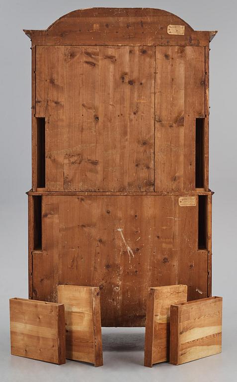 A Swedish rococo mahogany writing cabinet attributed to N. Dahlin (master in Stockholm-1761-87).