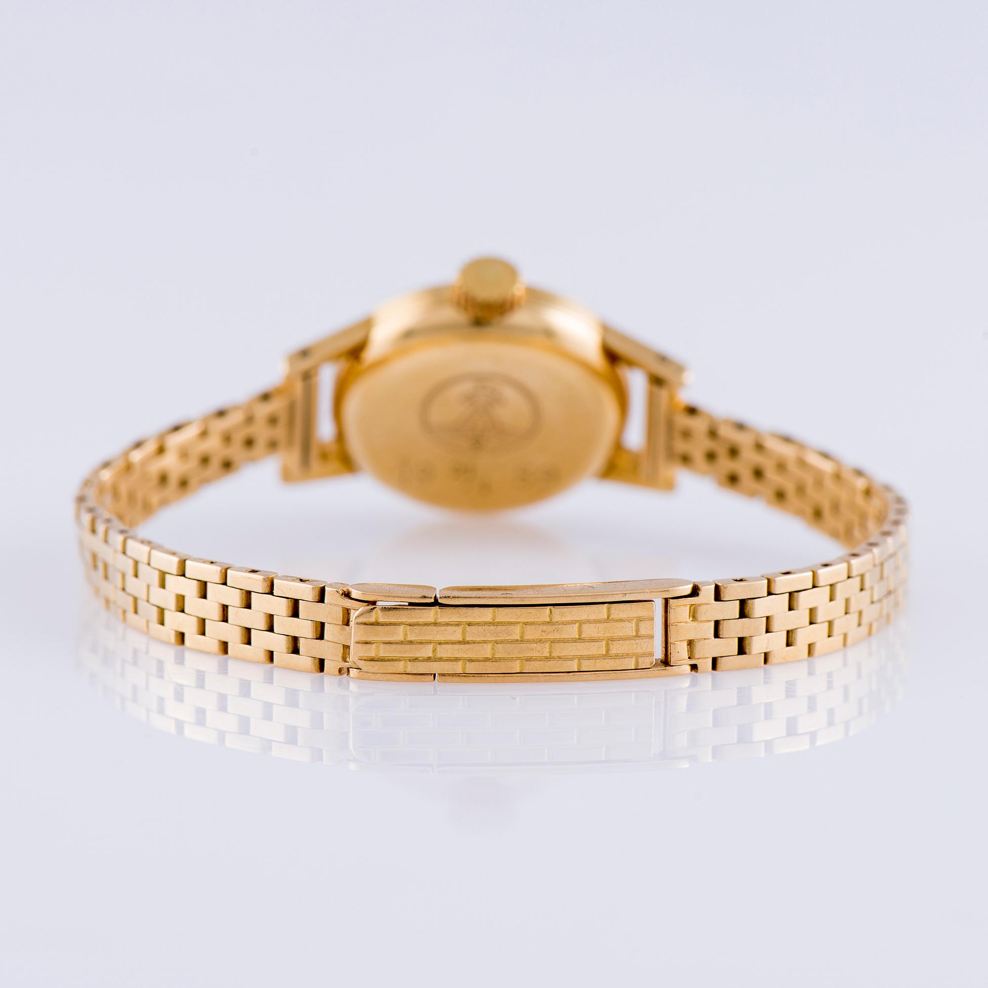 ARMBANDSUR, dam, Omega, guld. 1950-tal. Vikt tot. 29 g.