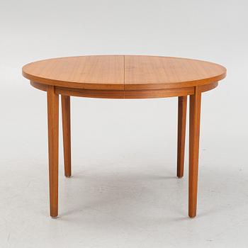 A dining table, mid 20th Century.