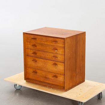 A teak veneered chest of drawers, designed by Olof Pira.